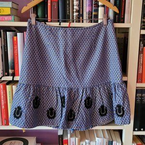 Embroidered skirt in blue, flax/grey, and black with zipper details